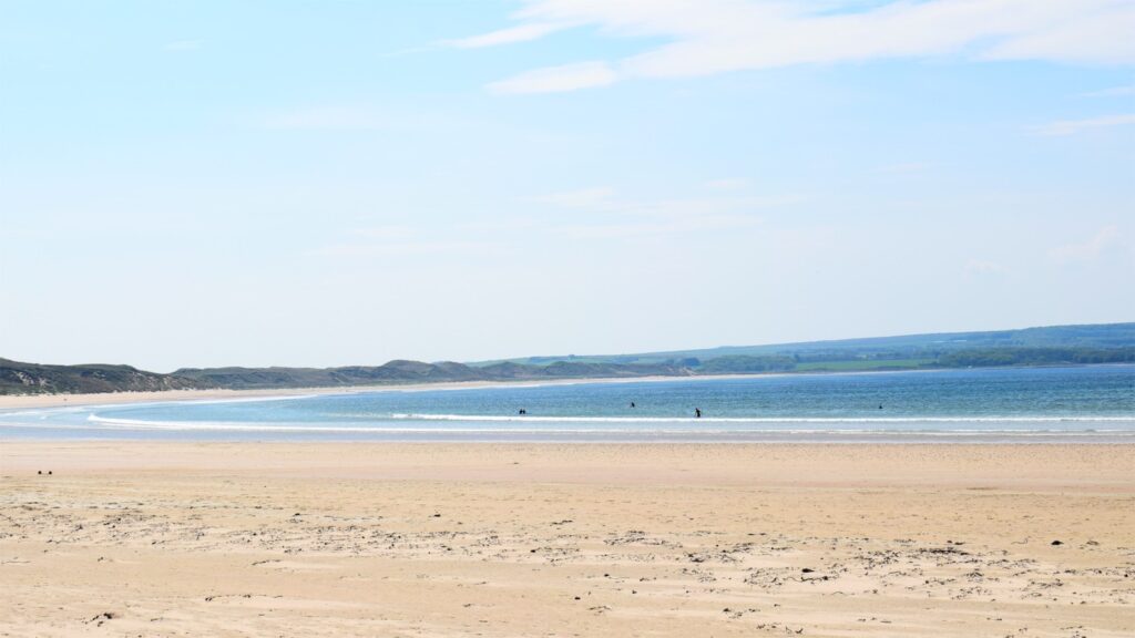 golden sandy beach on north coast of scotland NC500