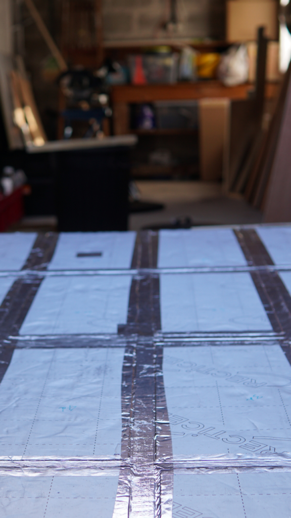 How to Build a Simple but Effective Van Floor This Pair Go There